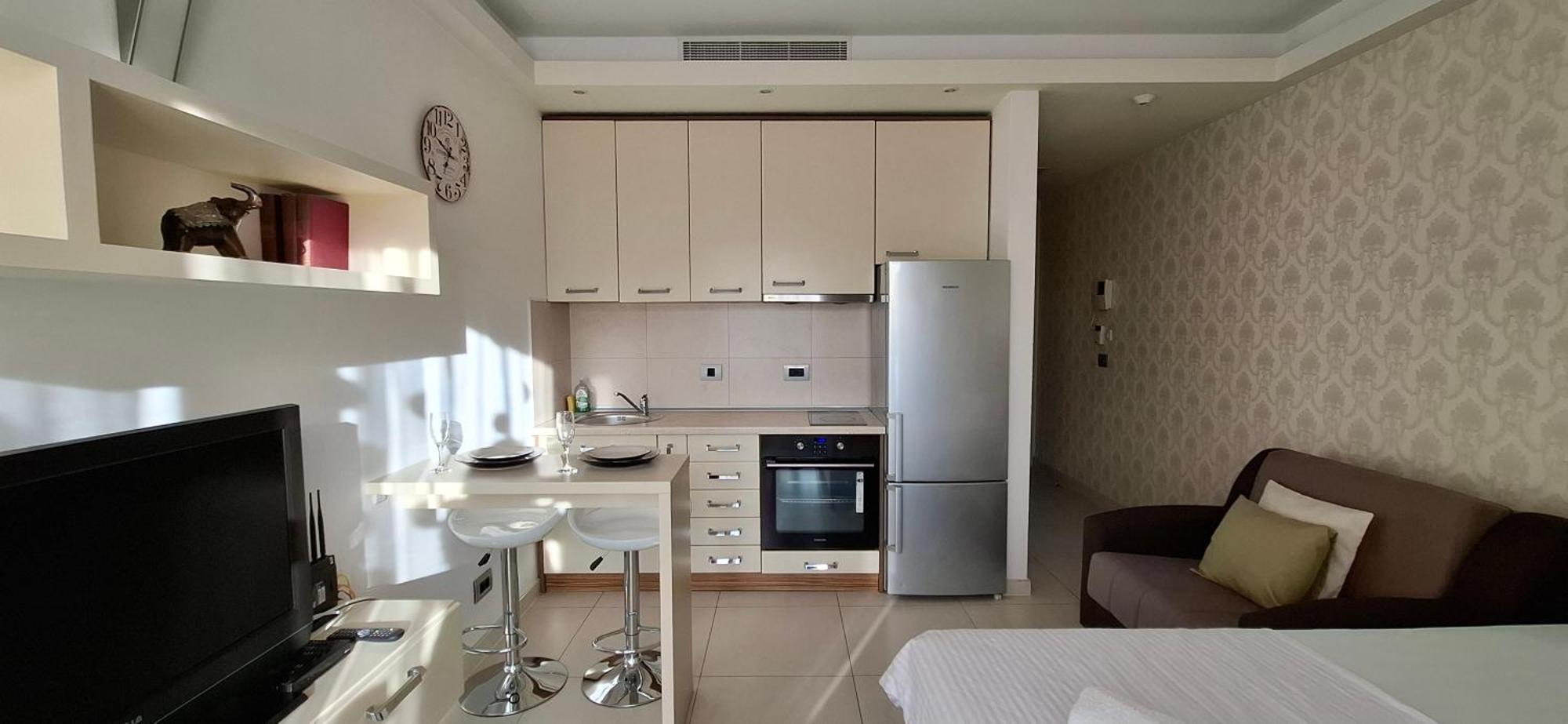 Tq Plaza Apartment